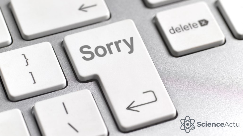 Clavier d'ordinateur avec une touche retour affichant le mot sorry